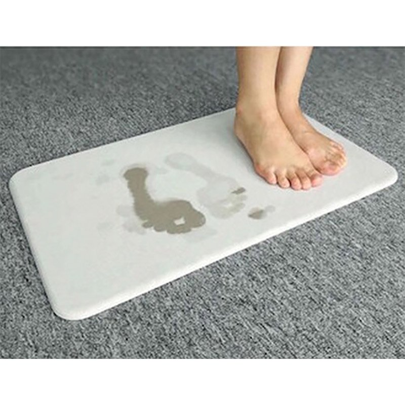 Alfombra de baño absorvente Alfombra de baño de diatomita blanca absorbiendo huellas húmedas