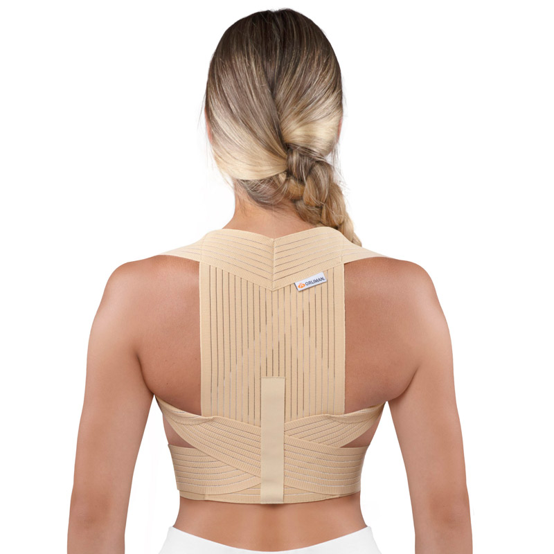Espaldillera transpirable Espaldillera transpirable con bandas cruzadas para corrección postural