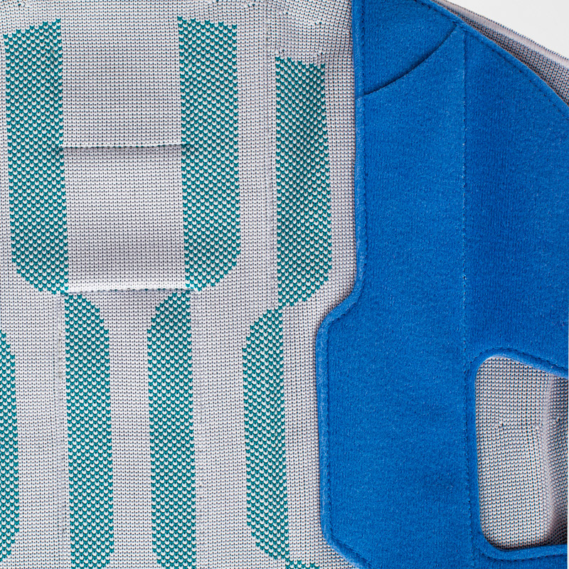 Faja lumbar Secutec Dorso Vista en primer plano del tejido rígido y panel de cierre de la ortesis lumbar SecuTec Dorso