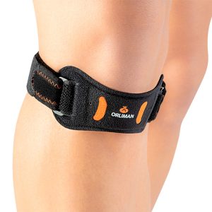 Cinta rotuliana ajustada sobre la rodilla para aliviar el dolor tendinoso