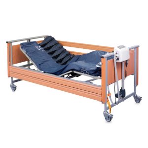 Instalación del sistema automático Toto en cama articulada asistencial